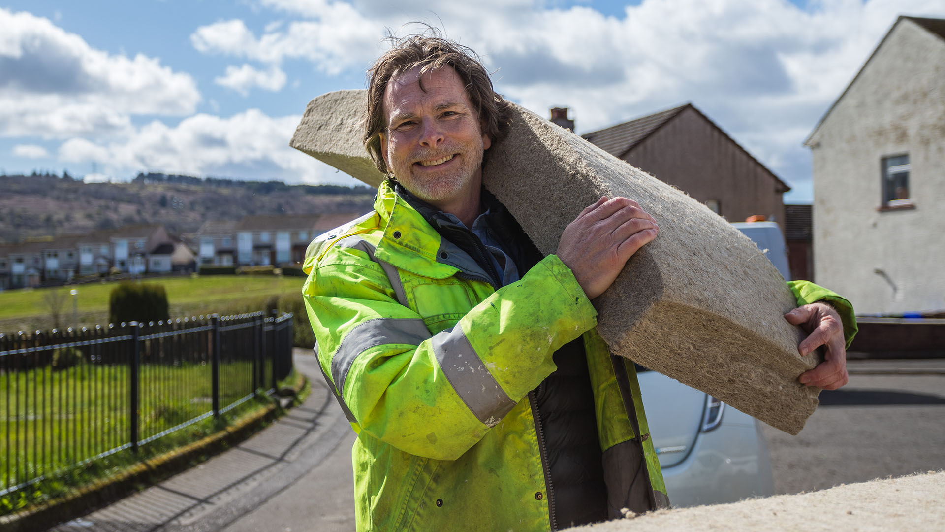 Scott holding IndiTherm, a flexible thermal insulation 'batt' made from UK-grown crops