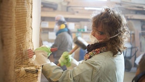 Removing clay plaster from strawbale walls